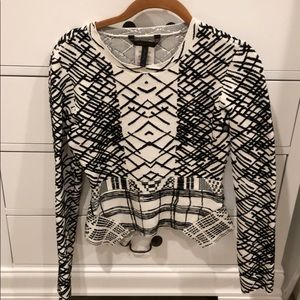 Knit tight top with peplum bottom fit.